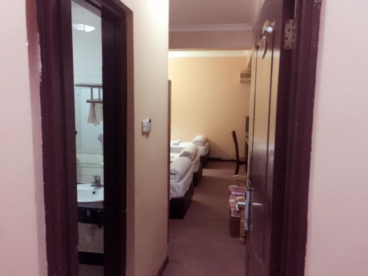 New Yuetan Hotel ダル・エス・サラーム エクステリア 写真