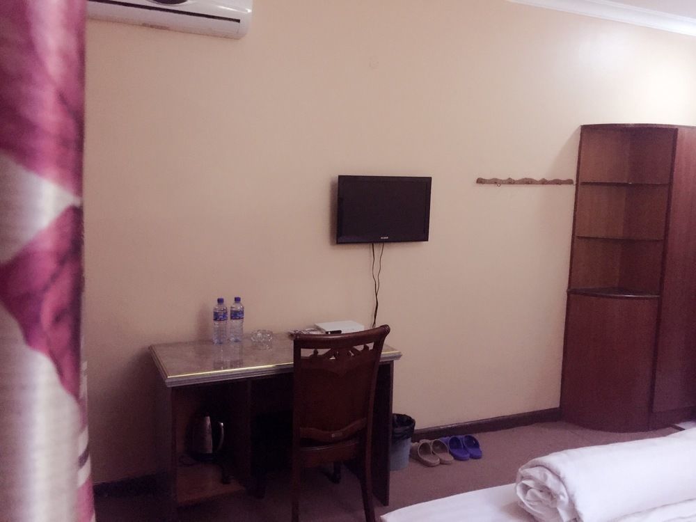 New Yuetan Hotel ダル・エス・サラーム エクステリア 写真