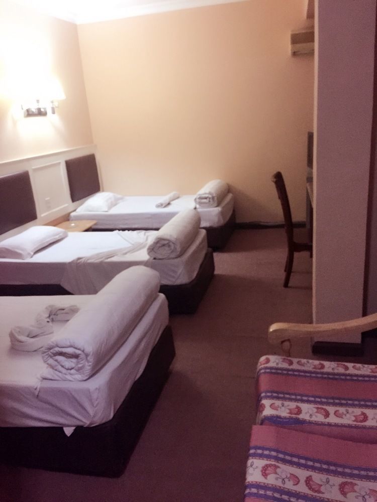 New Yuetan Hotel ダル・エス・サラーム エクステリア 写真